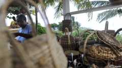 Woman selling baskets in Dominica
