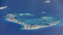 Chinese dredging vessels are purportedly seen in the waters around Mischief Reef in the disputed Spratly Islands