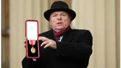 Van Morrison was introduced as Sir Ivan as he received his knighthood from Prince Charles