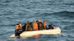 Migrants on a small dinghy
