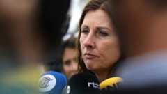 Silene Fredriksz, mother of one of the Malaysia Airlines flight MH17 victims, speaks with reporters, 19 June 2019