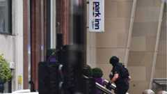 Armed police at the hotel