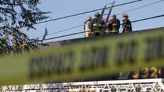 Firefighters investigate the scene of a overnight fire that claimed the lives of at least nine people at a warehouse in the Fruitvale neighborhood on 3 December, 2016