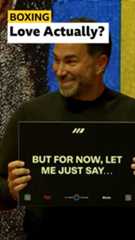 Eddie Hearn holding up a message board