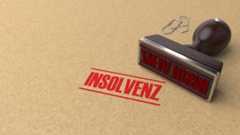 Stempel "Insolvenz" auf Papier