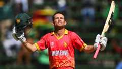 Sean Williams of Zimbabwe celebrates after scoring a century during the ICC Men's Cricket World Cup Qualifier Zimbabwe 2023 match between Zimbabwe and USA