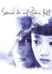 Schnee, der auf Zedern fällt