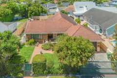 Perfectly located close to top schools, shops and main routes- this inviting family home ...