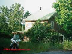 Photograph of - simple errors like this missing downspout elbow and extension can lead to a flooded basement 