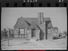 Detroit Michigan kit homes, some with an  M  monogram, possibly Modern Homes Construction Co., or - less likely - Montgomery Wards - under construction, 1930 - 1950 (C) InspectApedia.com Smorra 