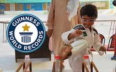 Kid unscrews bottle caps with kicks!