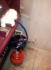 A gas cylinder and pipe found fitted at a compromised ATM before it could be detonated. Source: EAST.