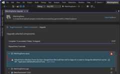 A screenshot of the .NET Upgrade Assistant's upgrade results tab, showing some of the result items have warning symbols.