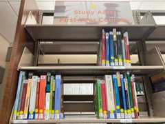 Print study aids on book shelf