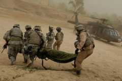 Image U.S. Army soldiers medically evacuate a wounded soldier.