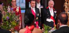 El presidente francés, Emmanuel Macron, al centro, durante un banquete junto al rey Carlos III y la princesa Catalina.