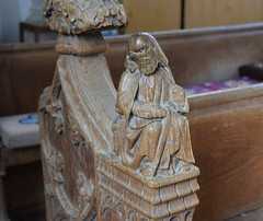 man with his hand on a book