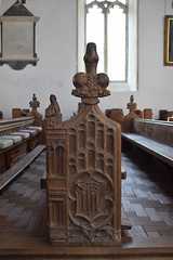 IHS bench end with Blessed Virgin at the Annunciation