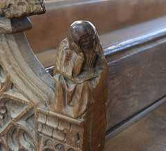 hooded figure holding head (Sloth?)