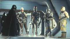 Bounty Hunters line up with Darth Vader.