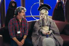George Lucas with Natalie Portman on the set of The Phantom Menace.