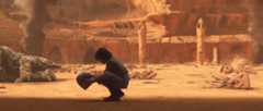 Boba holding Jango Fett's helmet
