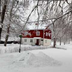 Vinterbild med butiken och mycket snö