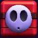 A red Polterguy as a block in Mario vs. Donkey Kong (Nintendo Switch)