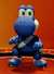 Image of Yoshi in a blue uniform, from Mario Strikers: Battle League