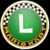 The icon of the Luigi Cup from Mario Kart Tour.
