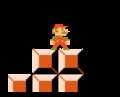 Mario sliding down a Goal Pole.