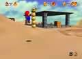 Mario jumping toward a Pokey
