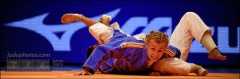 Judo sport Sankaku Gatame action photo