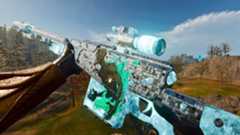 Inspecting the Victus XMR sniper rifle with Reflect 115 camo on Verdansk in Warzone