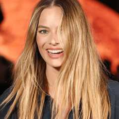 Margot Robbie’s Structured Black Minidress Is Perfect for Party Season