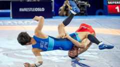 Wrestler recounts visa revocation