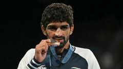 Olympic medallist banned for one year