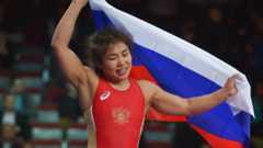 Wrestling champ banned over 2014 doping
