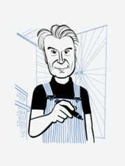 David Byrne holding a pencil.