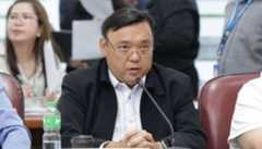 Former presidential spokesperson and congressman Harry Roque Jr. answers questions at the House of Representatives Quad Committee hearing on Aug .23, 2024.