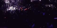 Image may contain Lighting Night Life and Crowd