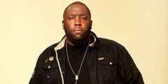 Image may contain Killer Mike Necklace Jewelry Accessories Accessory Human Person and Pendant