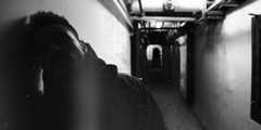 Image may contain City Town Building Urban Road Street Alleyway and Alley