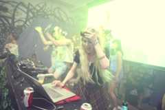 Image may contain Human Person Club Dj Electronics Pc Computer Laptop Keyboard and Computer Keyboard