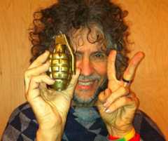 Image may contain Human Person Bomb Grenade Weapon Weaponry and Finger