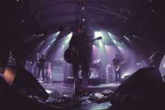 Image may contain Musical Instrument Guitar Leisure Activities Human Person Crowd Musician Concert and Rock Concert