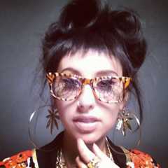Image may contain Glasses Accessories Accessory Human Person Sunglasses Andy Allo and Face
