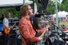 Image may contain Human Person Musical Instrument Guitar Leisure Activities Musician Music Band and Guitarist