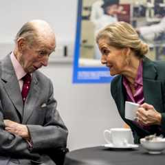 Duke of Kent and the Duchess of Edinburgh greet each other with a kiss as they take part in a rare joint engagement