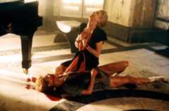 Image may contain Musical Instrument Piano Leisure Activities Human Person Flooring Clothing and Apparel